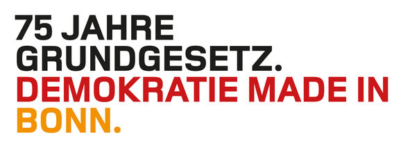 Das Logo zeigt in schwarz-rot-goldener Schrift den Text 75 Jahre Grundgesetz. Demokratie made in Bonn