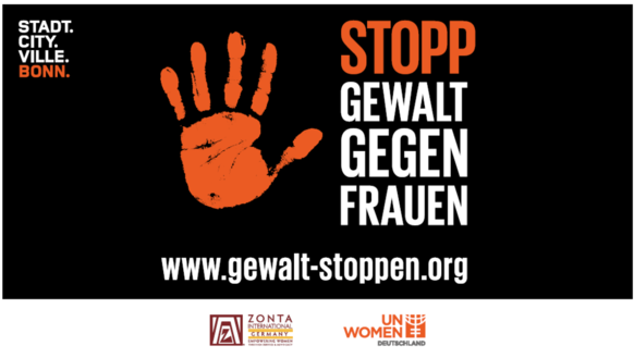 Orange Hand auf schwarzem Grund mit dem Spruch Stopp Gewalt gegen Frauen.